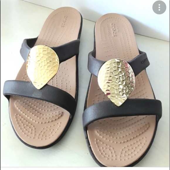 CROCS Shoes - CROCS brown / tan sandal/ flip flops with gold emblem